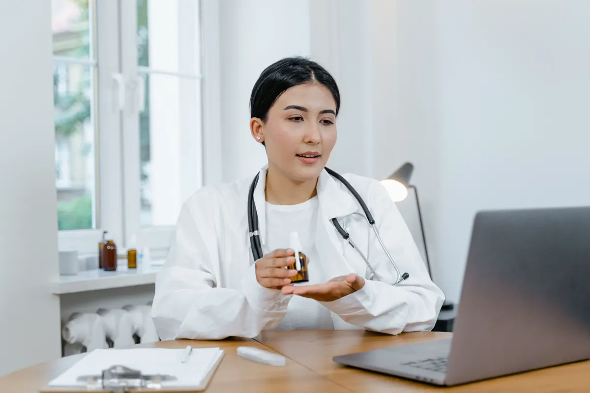 Prescriber discussing medication during a secure video visit