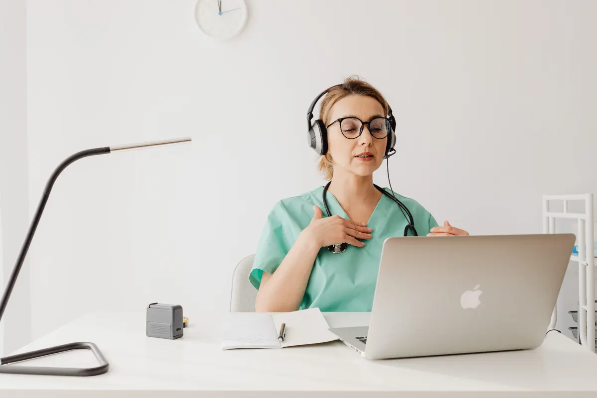 Clinician meeting with a patient over secure video